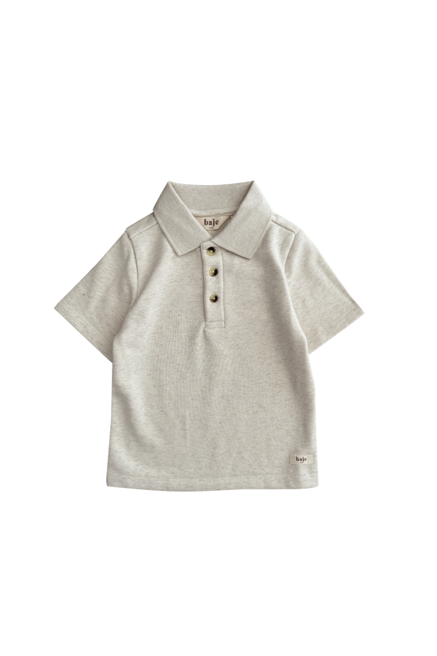 Jongens Polo Najera van Baje Studio in de kleur Creme melange in maat 134-140.