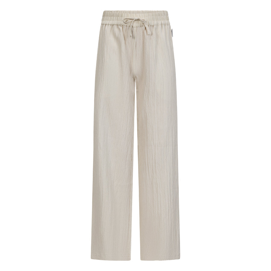 Meisjes Crinkle pants Mare van RETOUR in de kleur soft sand in maat 182-188.