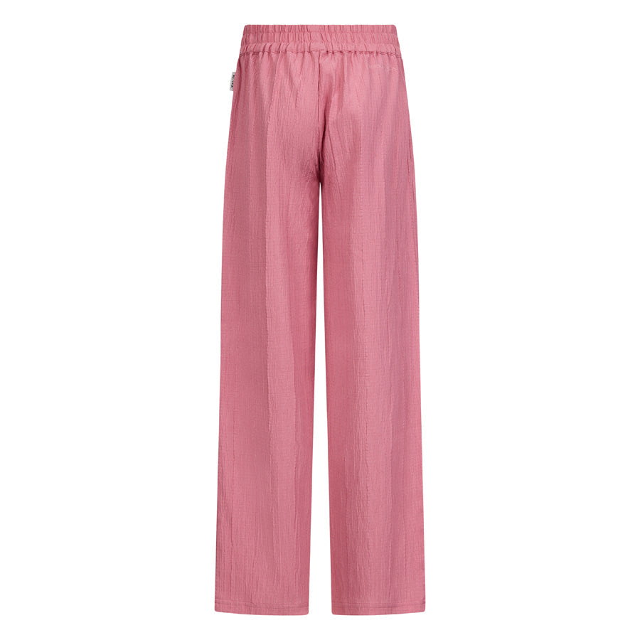 Meisjes Crinkle pants Mare van RETOUR in de kleur charm pink in maat 182-188.