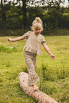 Meisjes Flower Pants van LOOXS Little in de kleur Orange Floral in maat 128.