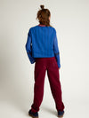 Meisjes Colour Jeans van LOOXS 10sixteen in de kleur Ruby red in maat 170-176.