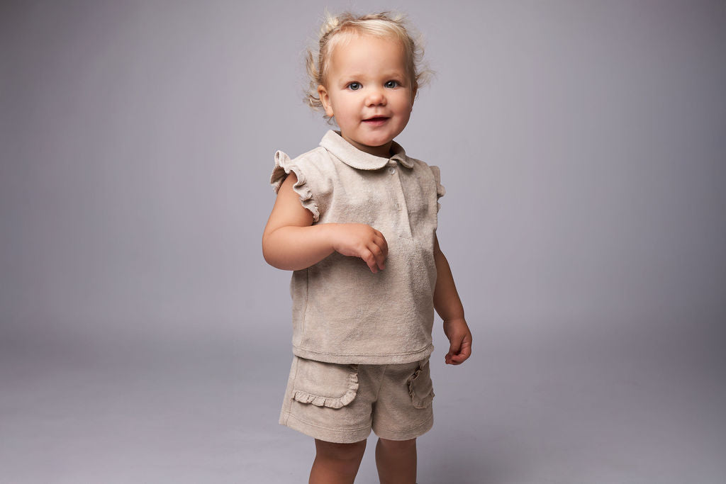 Meisjes Polo Ido van Gymp in de kleur Beige in maat 86.