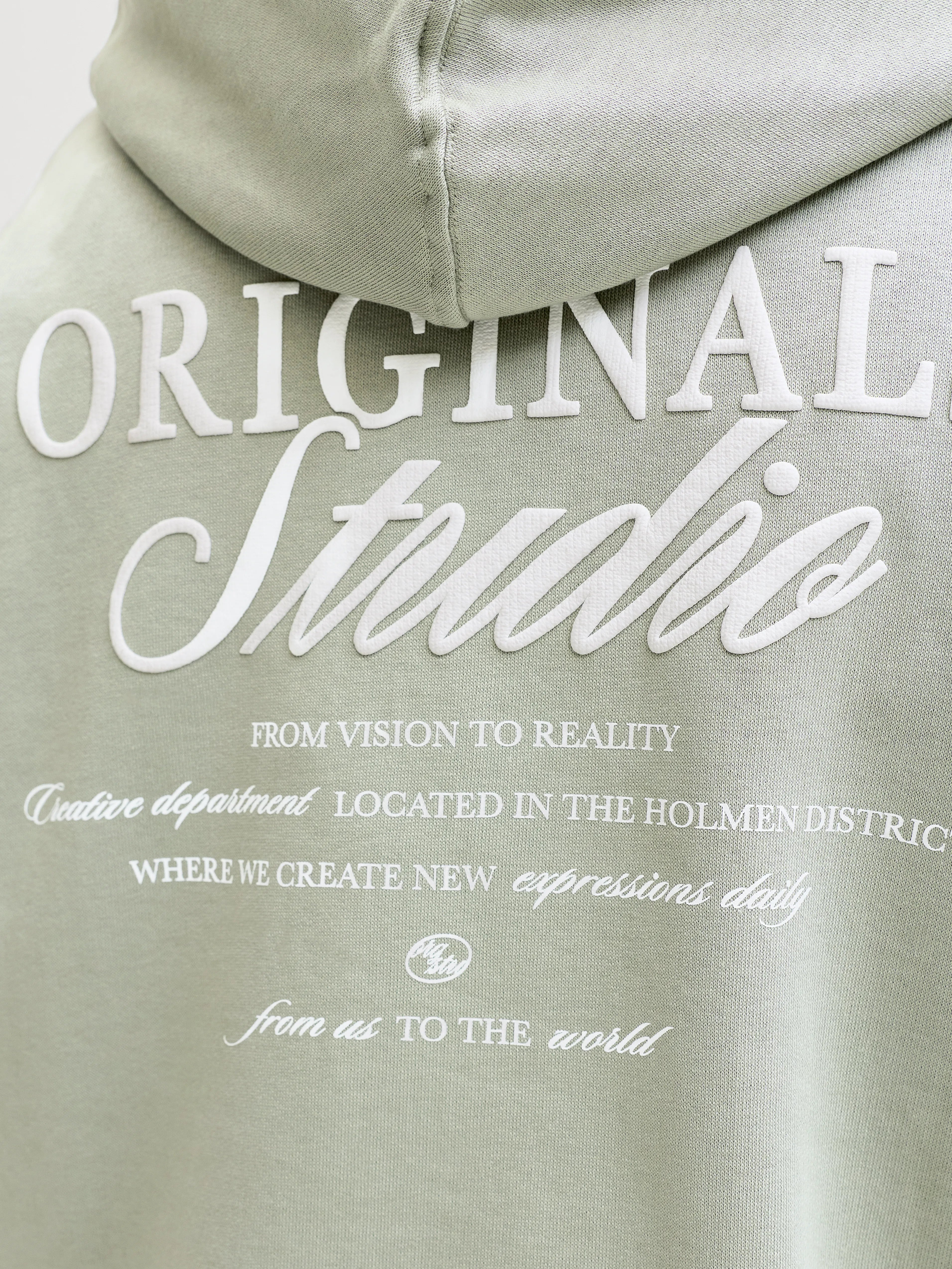 Jongens JORNORREBRO TYPO BACK SWEAT HOOD SN JNR van Jack & Jones Junior in de kleur Seagrass in maat 176.