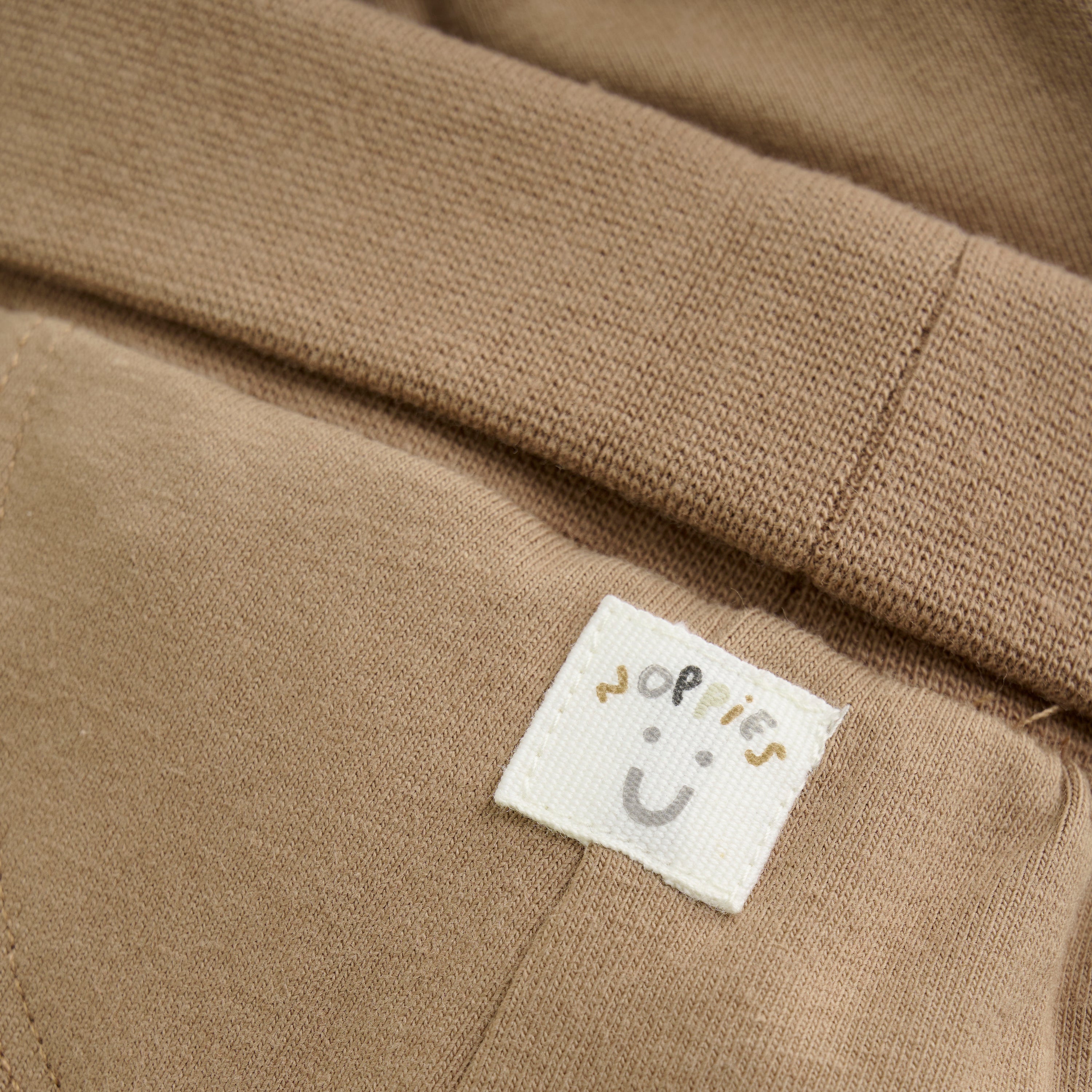 Unisexs U Pants Sterling regular fit van Noppies in de kleur Brown in maat 68.