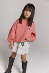 Meisjes Kids knitted cropped sweater van ALIX Mini in de kleur Bright Coral in maat 158-164.
