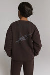 Meisjes Kids knitted world tour sweater van ALIX Mini in de kleur Warm Brown in maat 158-164.