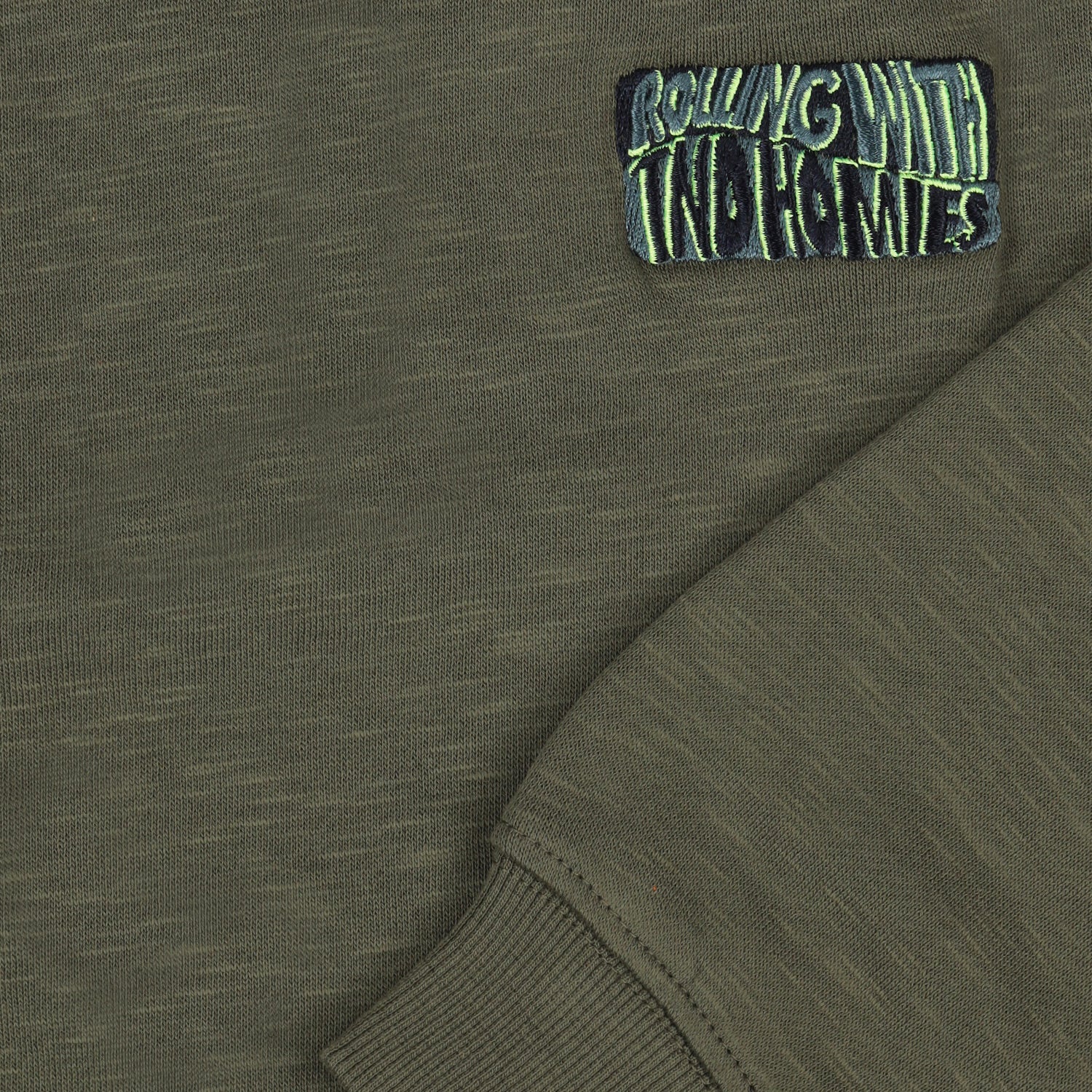 Jongens TND Sweatshirt Halfpipe van Tumble 'n Dry in de kleur central green in maat 128.