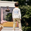 Jongens T-shirt Longsleeve Backprint van Daily7 in de kleur Egret in maat 128.