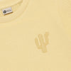 Meisjes T-shirt Ruffle Backprint van Daily7 in de kleur Reed Yellow in maat 128.