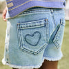 Meisjes Denim Shorts Heart van Daily7 in de kleur Blue Denim in maat 128.