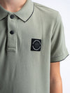 Jongens Boys Polo Short Sleeve van Petrol in de kleur Sage Green in maat 176.