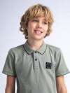 Jongens Boys Polo Short Sleeve van Petrol in de kleur Sage Green in maat 176.