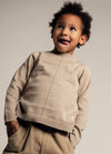 Jongens Longsleeve Orbe van Baje Studio in de kleur Sand desert in maat 134-140.