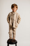 Jongens Longsleeve Polo Denezy van Baje Studio in de kleur Sand melange multicolor in maat 134-140.