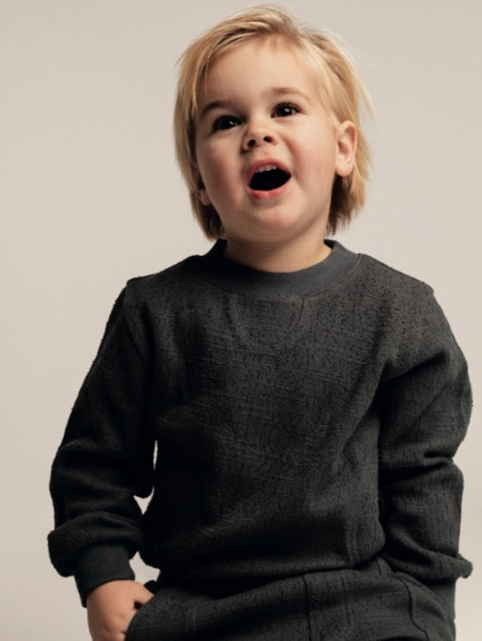 Jongens Sweater Etoy Oversized van Baje Studio in de kleur Blue vintage in maat 134-140.