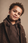 Jongens Bodywarmer Myso van Baje Studio in de kleur Brown choco in maat 134-140.