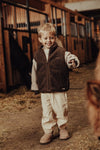 Jongens Bodywarmer Myso van Baje Studio in de kleur Brown choco in maat 134-140.