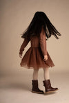 Meisjes Dress Longsleeve Junna van Baje Studio in de kleur Copper brown in maat 134-140.