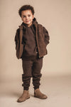 Jongens Sweatpants Port van Baje Studio in de kleur Brown choco in maat 134-140.