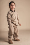 Jongens Sweater Yordin van Baje Studio in de kleur Taupe light in maat 134-140.