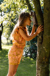 Meisjes Playsuit BELLEQS242 van Quapi in de kleur AOP Pink Leaves in maat 122-128.