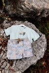Meisjes Swimshort BLEONQS240 van Quapi in de kleur AOP Sand Leaves in maat 122-128.