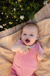 Meisjes Romper DESIREE van Quapi Newborn in de kleur Peach in maat 68.