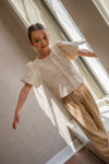 Meisjes Flora girls plisse pants with elastic waistband van Like Flo in de kleur Soft gold in maat 140.