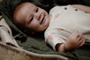 Jongens Romper GUIDO van Levv Newborn in de kleur AOP Orange Graphic in maat 68.