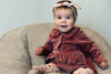 Meisjes Polo Dress Rib van Klein Baby in de kleur Reddish Brown in maat 74.