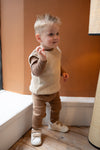 Jongens Knitted Spencer van Klein Baby in de kleur Ancient Scroll in maat 86.