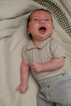 Jongens Polobody Shortsleeve van Klein Baby in de kleur Oxford Tan Beige in maat 74.