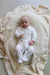 Jongens Babygrow with feet van Klein Baby in de kleur White in maat 62.