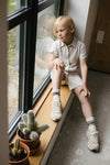 Jongens PANTS RICARDO van Little Levv in de kleur Cream in maat 128.
