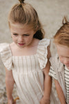 Meisjes DRESS SAMMY van Little Levv in de kleur AOP Taupe Stripe in maat 128.