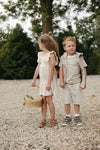 Jongens SHIRT SCOTT van Little Levv in de kleur AOP Cream Stripes in maat 128.