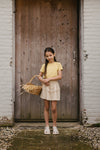 Meisjes SKIRT SOOF van Little Levv in de kleur AOP Sand Leaves in maat 128.
