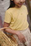 Meisjes SKIRT SOOF van Little Levv in de kleur AOP Sand Leaves in maat 128.