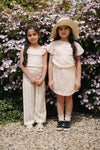 Meisjes PANTS STACY van Little Levv in de kleur AOP Taupe Stripe in maat 128.