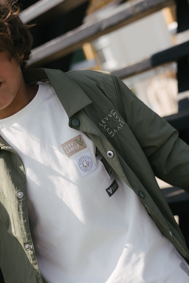 Jongens T-Shirt BANU van Little Levv in de kleur White Cream in maat 128.