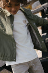 Jongens T-Shirt BANU van Little Levv in de kleur White Cream in maat 128.