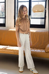 Meisjes Tommy Girls Plisse Blouse Light Gold van NoNo in de kleur Light Gold in maat 134-140.