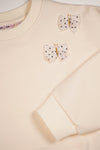 Meisjes Kimas sweater with embroidery at chest van NoNo in de kleur Pearled Ivory in maat 134-140.