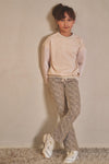 Meisjes Sady AOP Rib Jersey Flared Pants van NoNo in de kleur Pearled Ivory in maat 134-140.