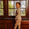 Jongens Sweater with rollneck van Koko Noko in de kleur Dark sand in maat 128.