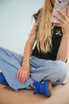 Meisjes Kasis T-shirt Take a Break print at back van NoBell in de kleur Jet Black in maat 170-176.