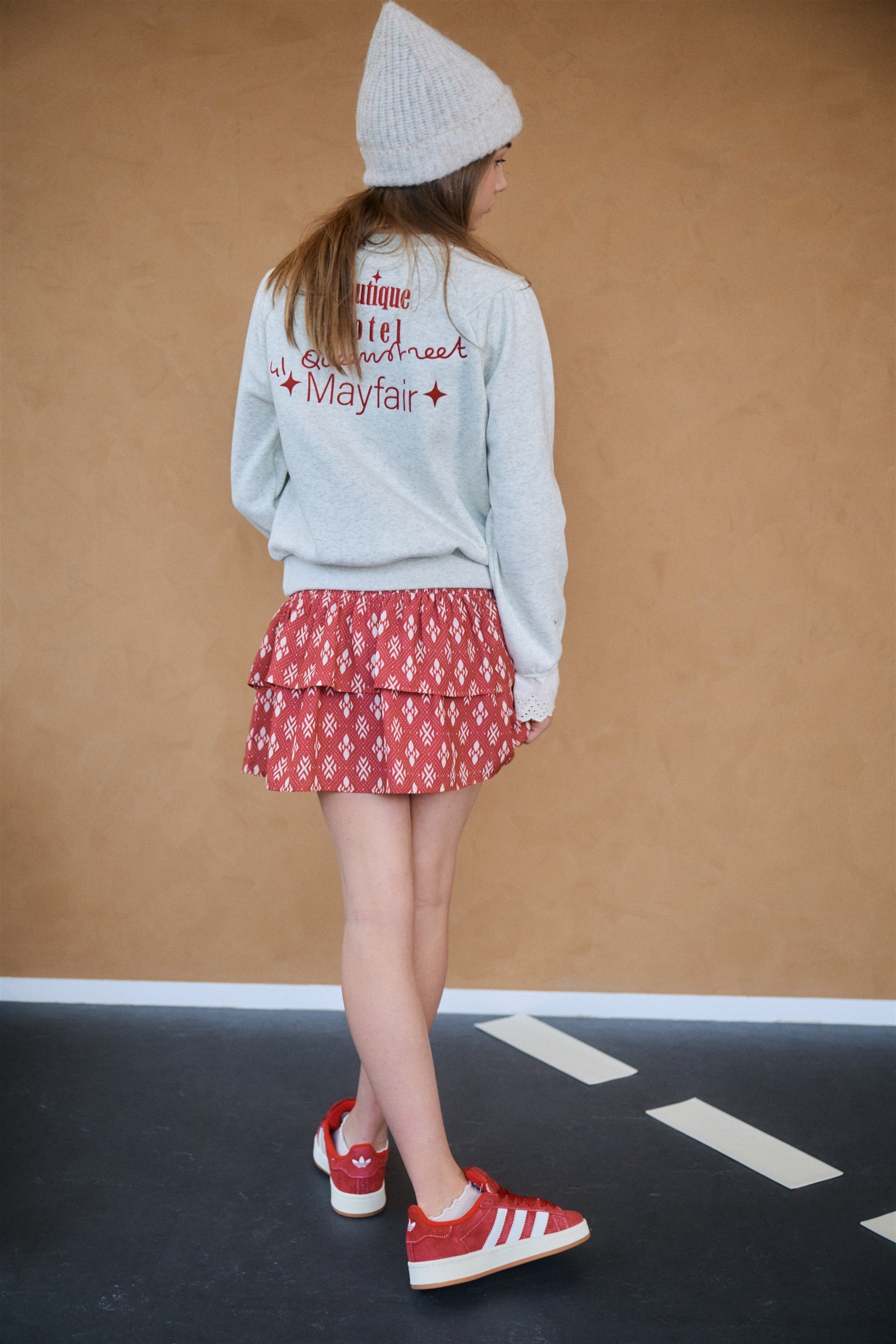 Meisjes Nika Smocked layered skirt van NoBell in de kleur Ruby Red in maat 170-176.