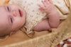 Meisjes DRESS GABI van Quapi Newborn in de kleur AOP White Sketch in maat 74.