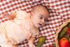Meisjes SHIRT GERSJE van Quapi Newborn in de kleur Peach in maat 74.