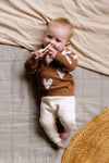 Unisexs Pants COENQNBW23 van Quapi Newborn in de kleur Creme in maat 68.